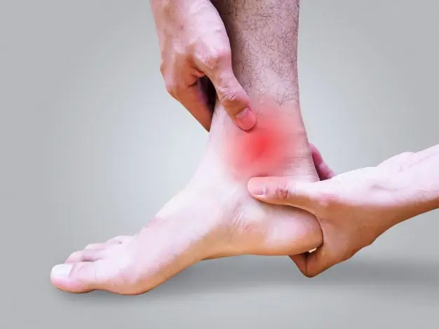 Young Man Suffering Foot Ankle Pain Sprained Ankle 43520 434